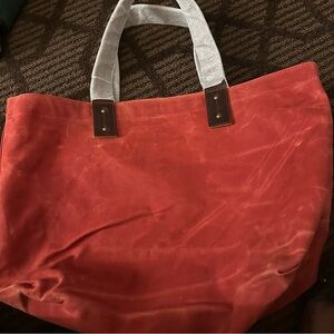 L.L. Bean Red   rugged Canvas Tote with and Brown handals  never used.